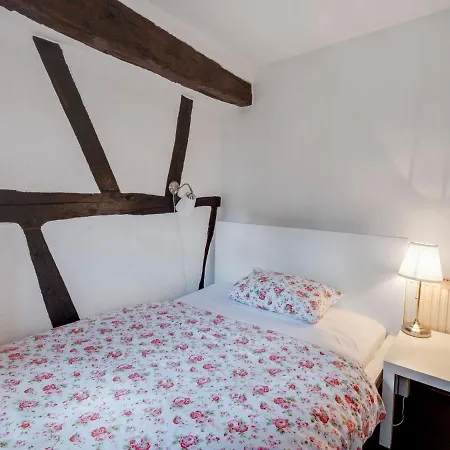 A Lovely Watermill Surrounded By Delightful Greenery *
